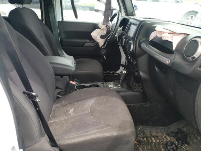 Photo 5 from auction – 2014 JEEP WRANGLER U with VIN 1C4BJWDG7EL207751