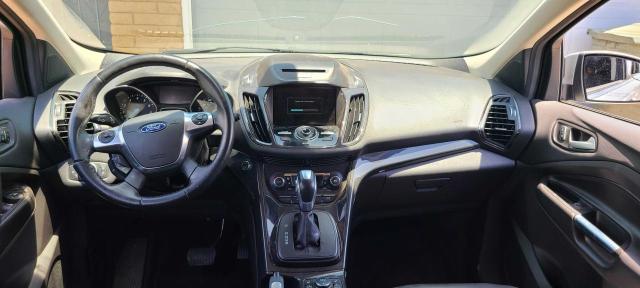 Photo 9 from auction – 2015 FORD ESCAPE TIT with VIN 1FMCU9J95FUC63228