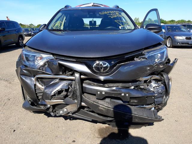 Photo 7 from auction – 2018 TOYOTA RAV4 LE with VIN JTMBFREV5JD251736