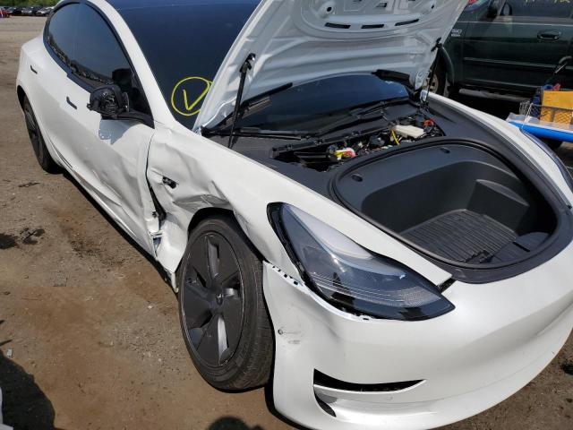 Photo 9 from auction – 2022 TESLA MODEL 3 with VIN 5YJ3E1EB6NF273953