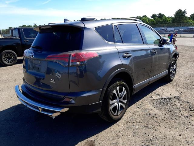 Photo 4 from auction – 2018 TOYOTA RAV4 LE with VIN JTMBFREV5JD251736