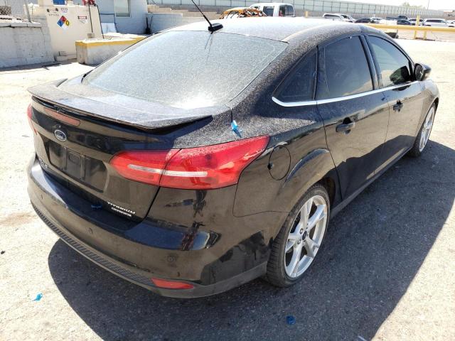 Photo 4 from auction – 2015 FORD FOCUS TITA with VIN 1FADP3J29FL275085