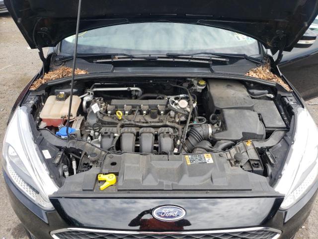 Photo 7 from auction – 2016 FORD FOCUS SE with VIN 1FADP3F29GL392997