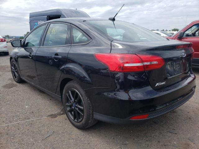 Photo 3 from auction – 2016 FORD FOCUS SE with VIN 1FADP3F29GL392997