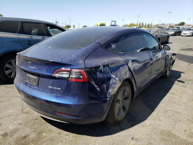 Photo 4 from auction – 2021 TESLA MODEL 3 with VIN 5YJ3E1EBXMF999538
