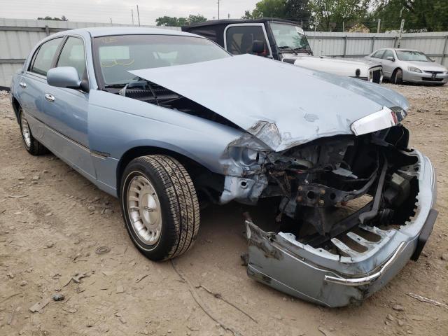 LINCOLN TOWN CAR E 1998 with VIN 1LNFM81WXWY713638 - Photo from auction