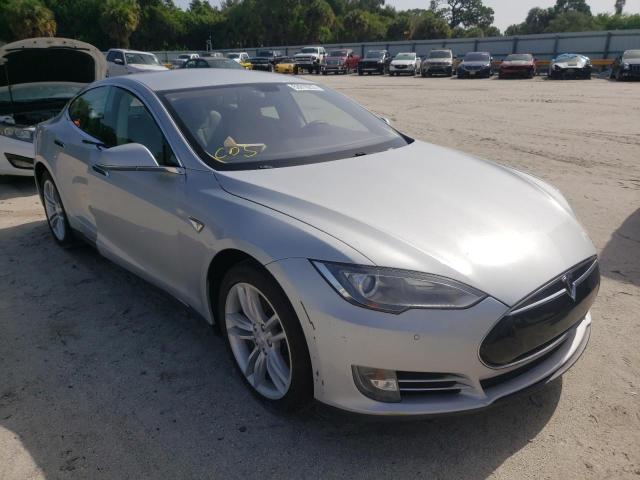 TESLA MODEL S 2014 with VIN 5YJSA1S11EFP47908 - Photo from auction