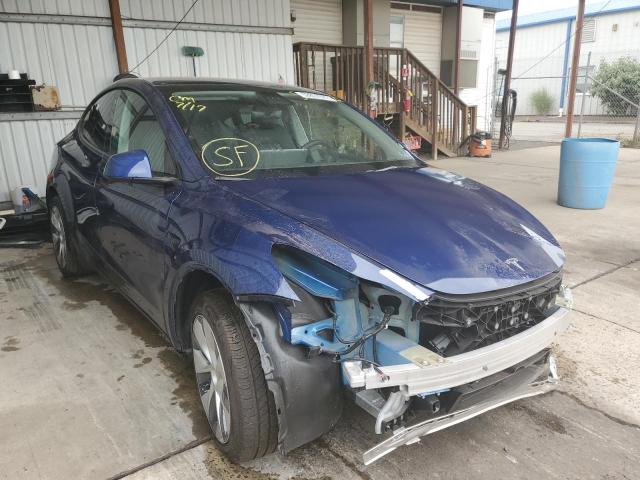 TESLA MODEL Y 2022 with VIN 7SAYGDEE4NF398707 - Photo from auction