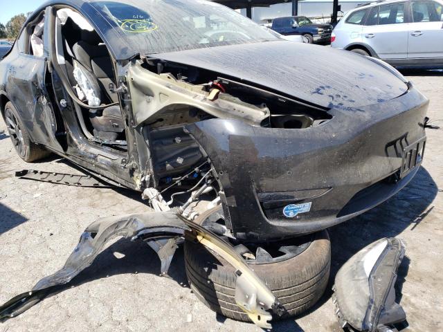 Photo 9 from auction – 2021 TESLA MODEL Y with VIN 5YJYGAEE2MF191131