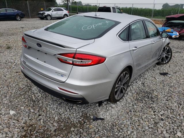 Photo 4 from auction – 2019 FORD FUSION TIT with VIN 3FA6P0D95KR107004