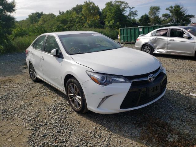 TOYOTA CAMRY LE 2017 with VIN 4T1BF1FK3HU800409 - Photo from auction