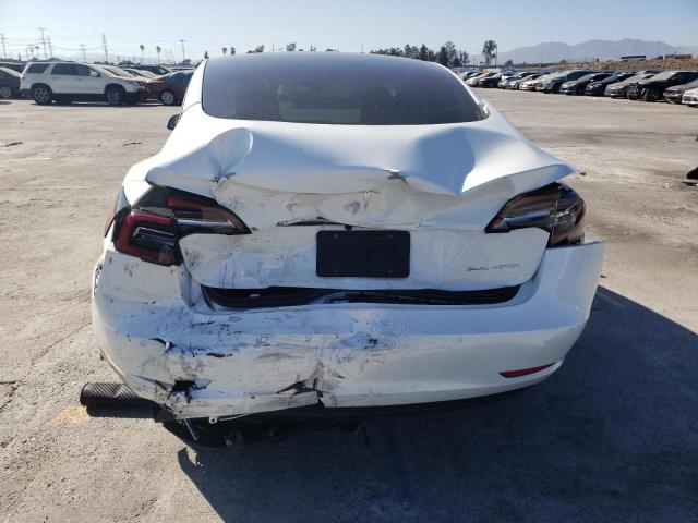 Photo 9 from auction – 2022 TESLA MODEL 3 with VIN 5YJ3E1EB9NF114344