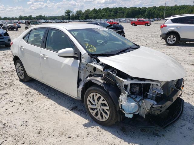 TOYOTA COROLLA L 2017 with VIN 5YFBURHE5HP573415 - Photo from auction