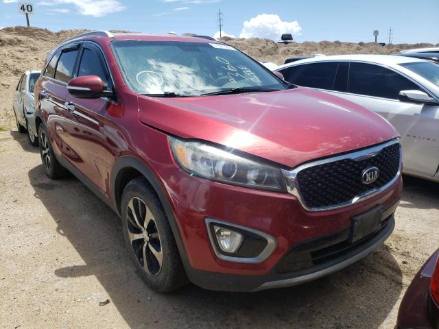 KIA SORENTO EX 2016 with VIN 5XYPHDA53GG103412 - Photo from auction