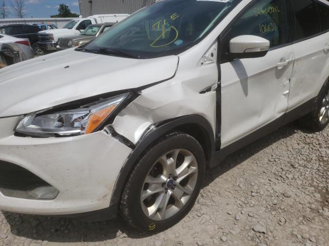 Photo 9 from auction – 2015 FORD ESCAPE TIT with VIN 1FMCU9J99FUB46526