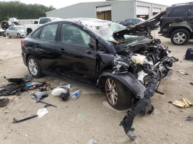 FORD FOCUS SE 2016 with VIN 1FADP3F2XGL323526 - Photo from auction
