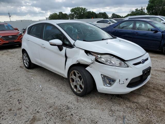 FORD FIESTA SES 2011 with VIN 3FADP4FJ2BM196114 - Photo from auction