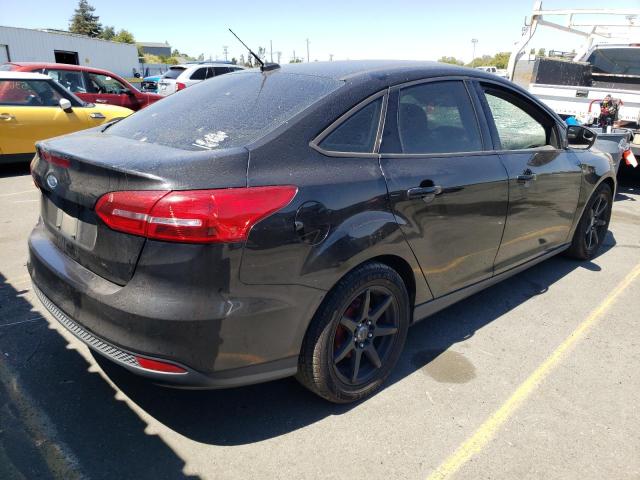 Photo 4 from auction – 2015 FORD FOCUS SE with VIN 1FADP3F24FL203803