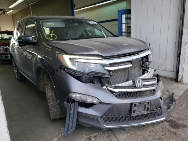HONDA PILOT TOUR 2017 with VIN 5FNYF6H93HB009991 - Photo from auction