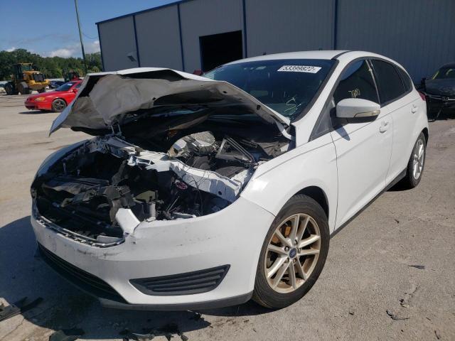 Photo 2 from auction – 2016 FORD FOCUS SE with VIN 1FADP3K26GL356609