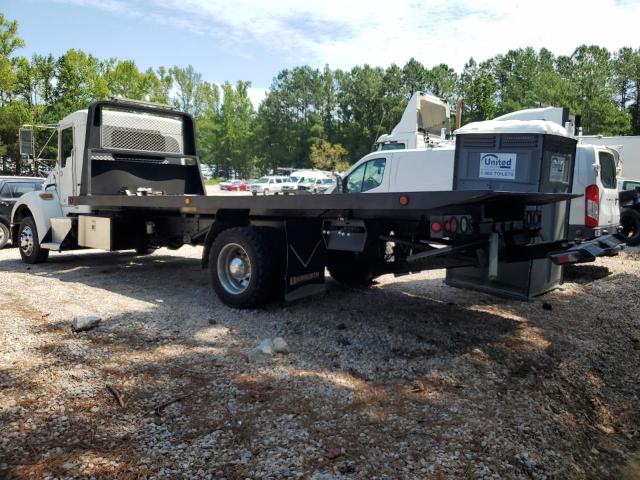 Photo 3 from auction – 2003 KENWORTH CONSTRUCTI with VIN 2NKMHD6H03M896935