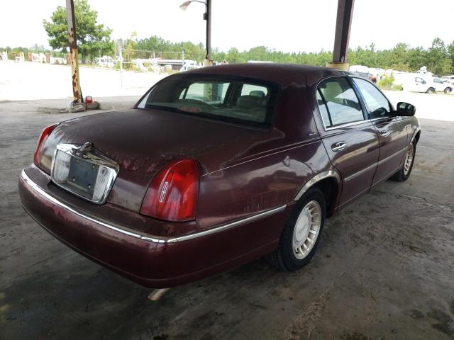 Photo 4 from auction – 2001 LINCOLN TOWN CAR E with VIN 1LNHM81W61Y608810