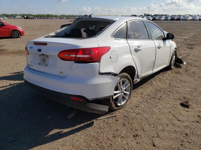 Photo 4 from auction – 2018 FORD FOCUS SE with VIN 1FADP3FE0JL321401