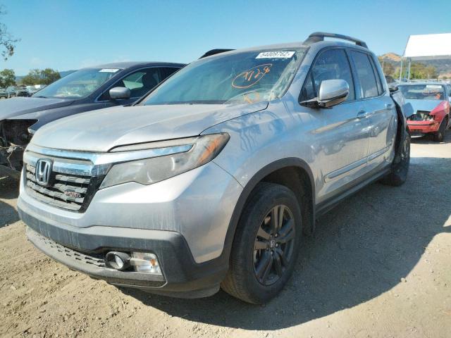 Photo 2 from auction – 2019 HONDA RIDGELINE with VIN 5FPYK2F15KB005828