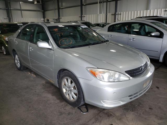 TOYOTA CAMRY LE 2002 with VIN 4T1BF30K62U538560 - Photo from auction