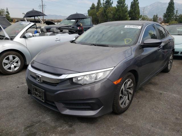 Photo 2 from auction – 2017 HONDA CIVIC EX with VIN 2HGFC2F71HH551502