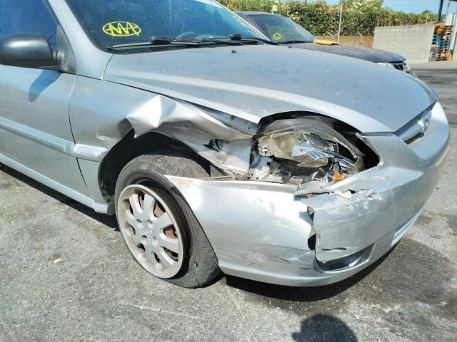 Photo 9 from auction – 2003 KIA RIO CINCO with VIN KNADC165X36144008