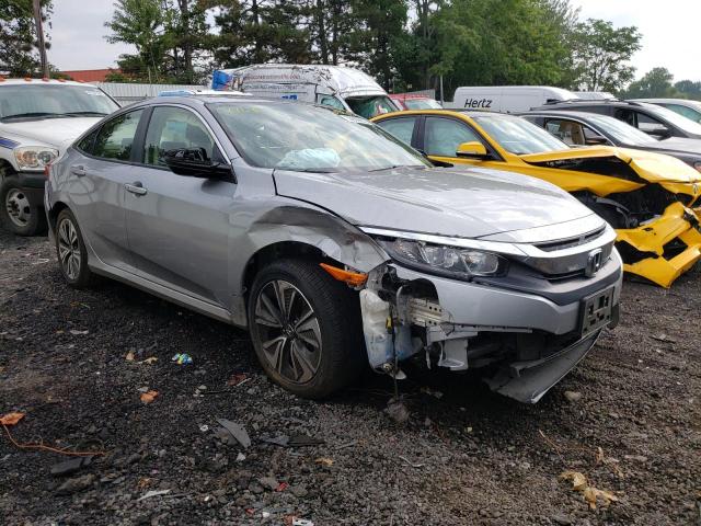 HONDA CIVIC EXL 2018 with VIN JHMFC1F77JX027098 - Photo from auction