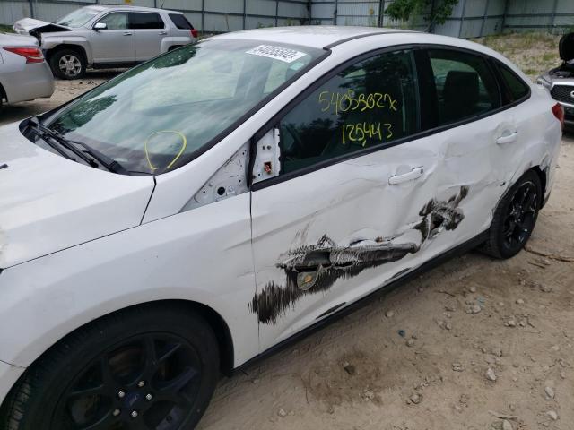 Photo 9 from auction – 2014 FORD FOCUS SE with VIN 1FADP3F21EL314663