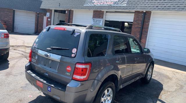 Photo 4 from auction – 2011 FORD ESCAPE LIM with VIN 1FMCU0EG4BKB73756
