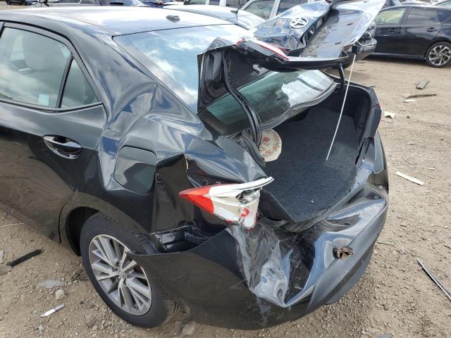 Photo 9 from auction – 2014 TOYOTA COROLLA L with VIN 2T1BURHE8EC204799