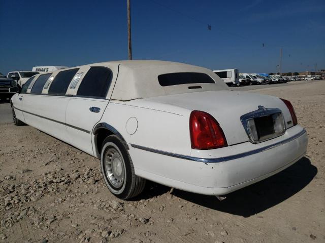 Photo 3 from auction – 2000 LINCOLN TOWN CAR E with VIN 1L1FM81W9YY825576