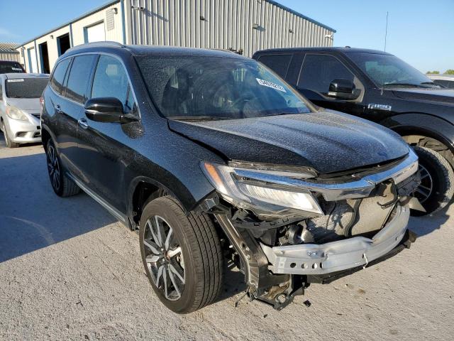 HONDA PILOT TOUR 2020 with VIN 5FNYF5H69LB001841 - Photo from auction