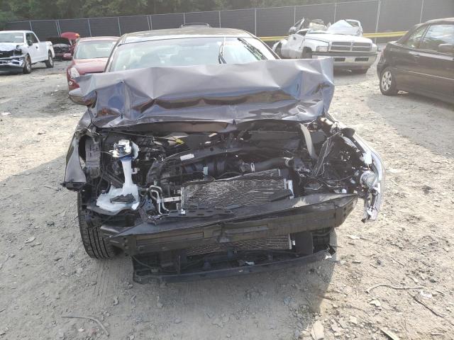 Photo 9 from auction – 2018 KIA FORTE LX with VIN 3KPFL4A75JE224572
