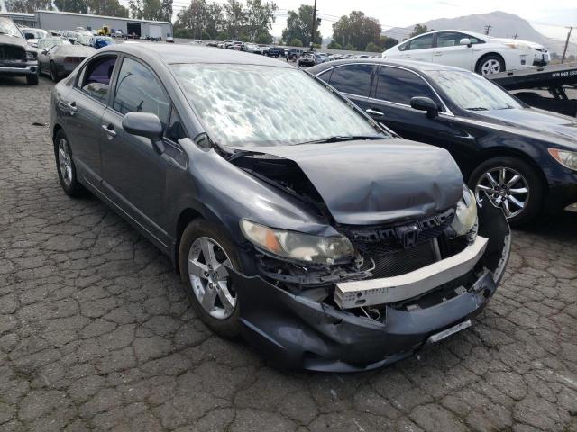 HONDA CIVIC LX 2011 with VIN 2HGFA1F51BH305409 - Photo from auction