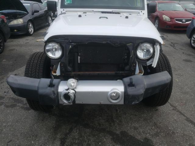 Photo 9 from auction – 2015 JEEP WRANGLER S with VIN 1C4AJWBG9FL742838