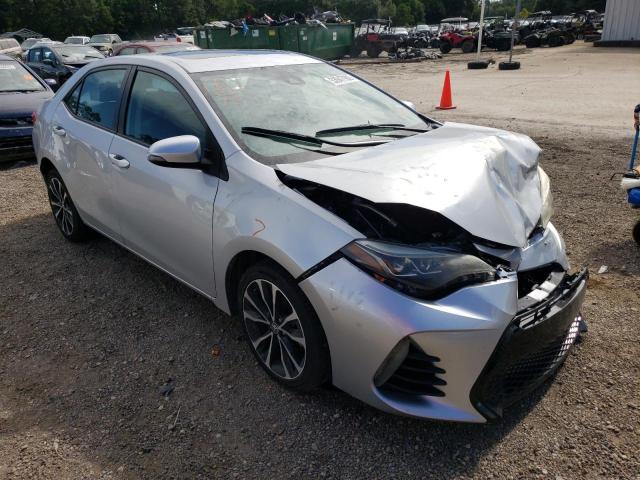 TOYOTA COROLLA L 2017 with VIN 5YFBURHEXHP586807 - Photo from auction