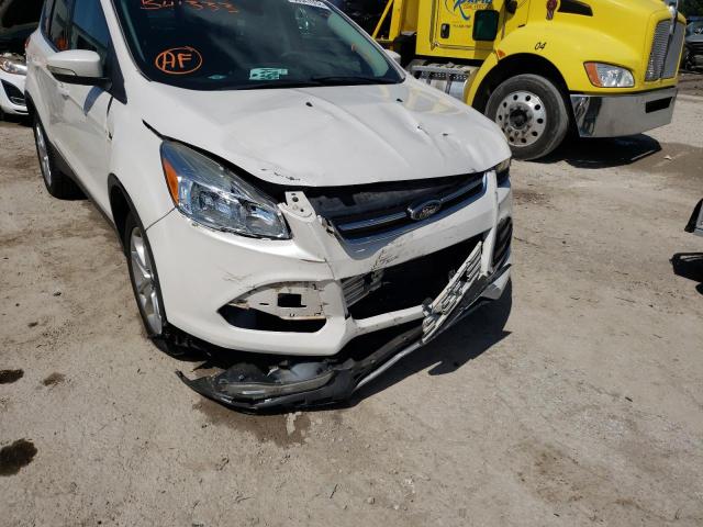 Photo 9 from auction – 2016 FORD ESCAPE TIT with VIN 1FMCU9JX6GUB41333