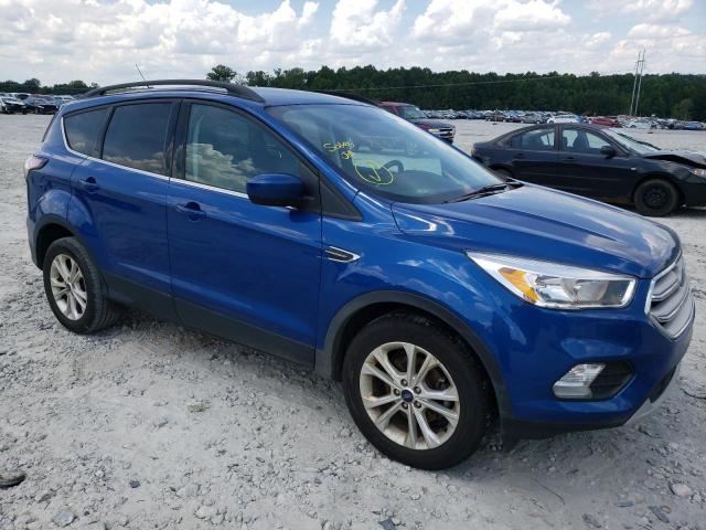 FORD ESCAPE SE 2018 with VIN 1FMCU0GD6JUC87327 - Photo from auction