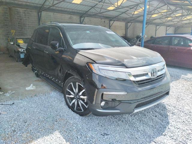HONDA PILOT TOUR 2022 with VIN 5FNYF5H98NB004422 - Photo from auction