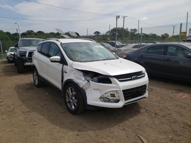 FORD ESCAPE TIT 2015 with VIN 1FMCU0JX0FUA75596 - Photo from auction