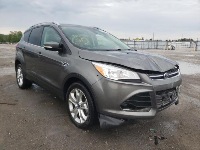 FORD ESCAPE TIT 2014 with VIN 1FMCU0J9XEUB33097 - Photo from auction