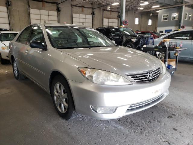 TOYOTA CAMRY LE 2005 with VIN 4T1BF30K75U104880 - Photo from auction