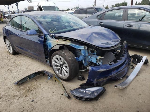 TESLA MODEL 3 2022 with VIN 5YJ3E1EAXNF143195 - Photo from auction