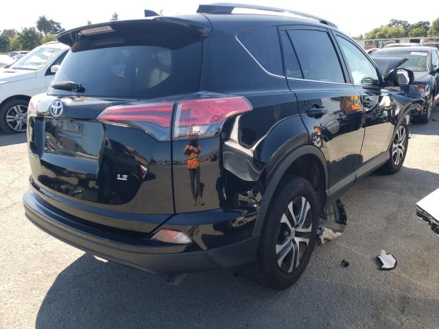 Photo 4 from auction – 2018 TOYOTA RAV4 LE with VIN 2T3ZFREV5JW405864