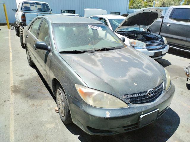 TOYOTA CAMRY LE 2002 with VIN JTDBE32KX20091906 - Photo from auction